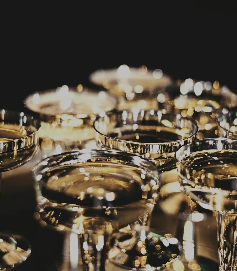 Champagne glasses in the gallery as guests arrive